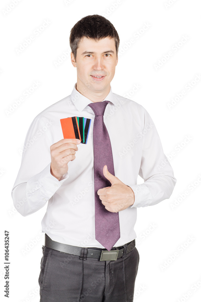 portrait of young smiling business man holding credit card. portrait of young smiling business man holding credit card.