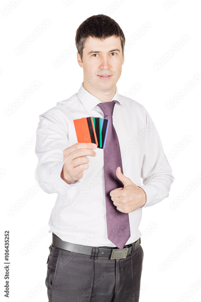 portrait of young smiling business man holding credit card. isolated on white background portrait of young smiling business man holding credit card. isolated on white background