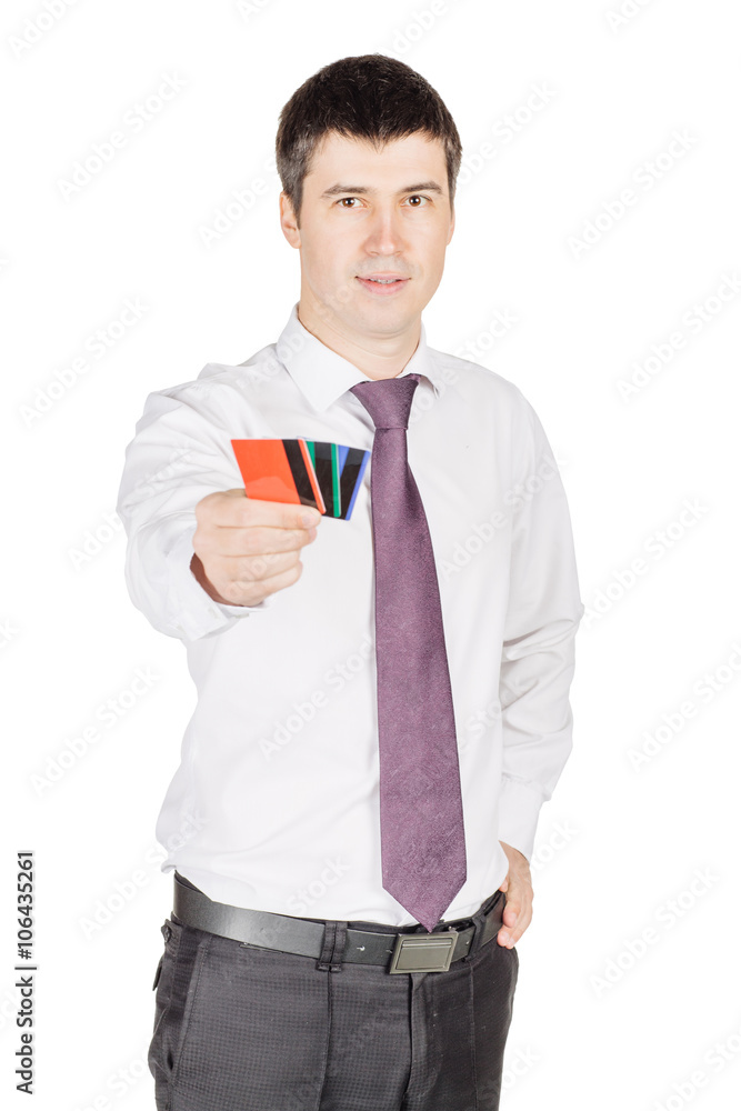 portrait of young smiling business man holding credit card. isolated on white background portrait of young smiling business man holding credit card. isolated on white background