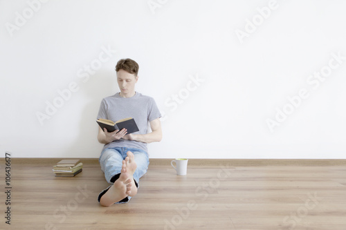 Man reading a book.