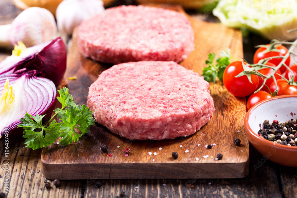 fresh raw beef burger for hamburger with vegetables fresh raw beef burger for hamburger with vegetables