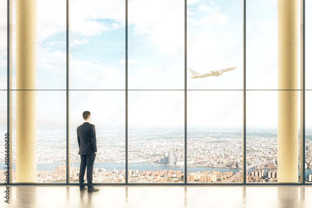 Interior with windows and businessman