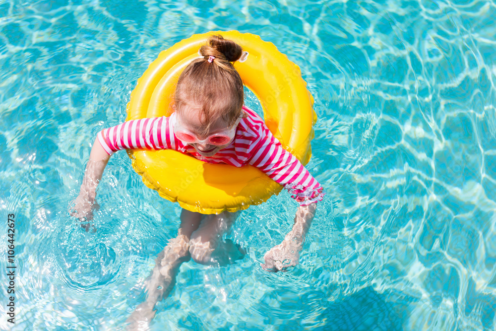Little girl at swimming pool