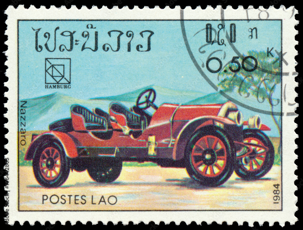 Stamp printed in Laos shows vintage car Nazzaro