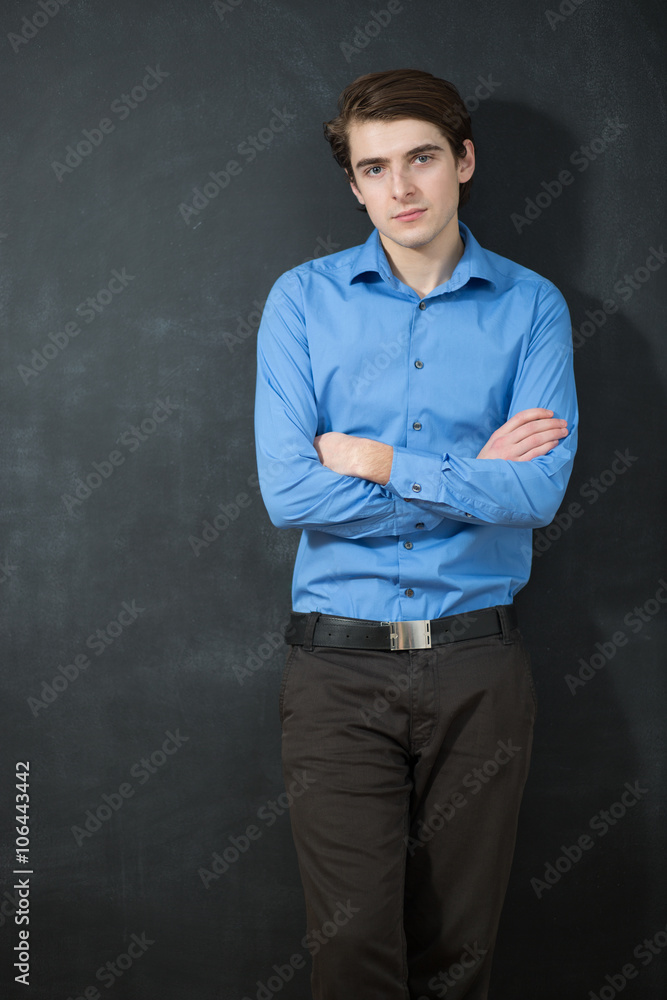 Happy smiling businessman with crossed arms pose, with blank cop Happy smiling businessman with crossed arms pose, with blank cop