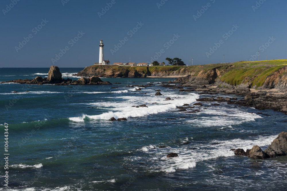 Pigeon Point Lighthouse. Perched on a cliff on the central California coast, 50 miles south of San Francisco, the 115-foot Pigeon Point Lighthouse has been guiding mariners since 1872. Pigeon Point Lighthouse. Perched on a cliff on the central California coast, 50 miles south of San Francisco, the 115-foot Pigeon Point Lighthouse has been guiding mariners since 1872.