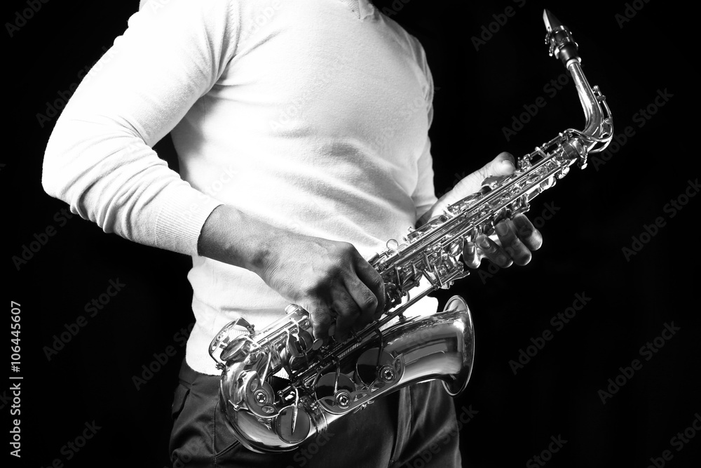 Obraz premium African American jazz musician playing the saxophone, closeup