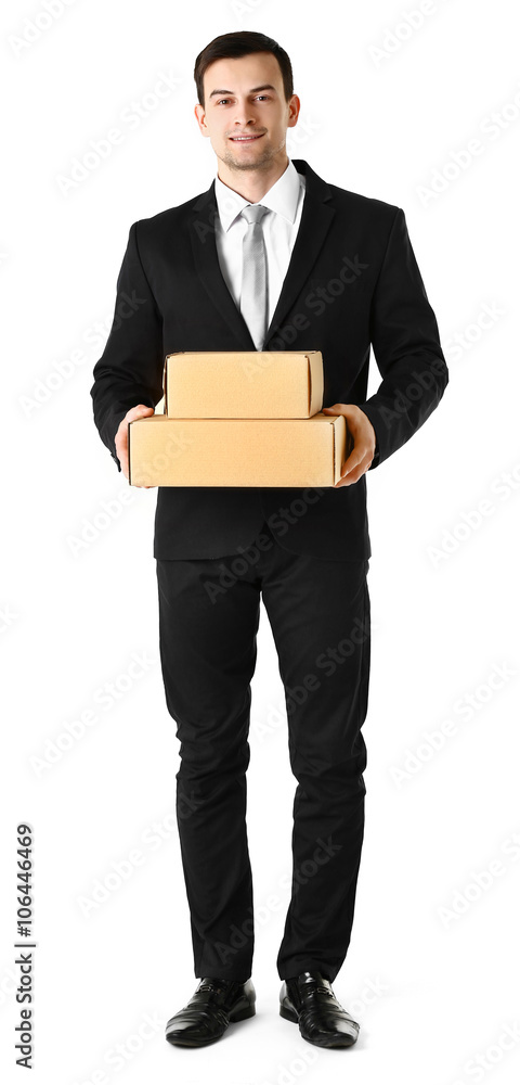 Man in suit holding carton boxes isolated on white background Man in suit holding carton boxes isolated on white background