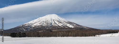 Mt Yotei (Mount Youtei) - Hokkaido, Japan Snow Capped Volcano on a Sunny Day photo