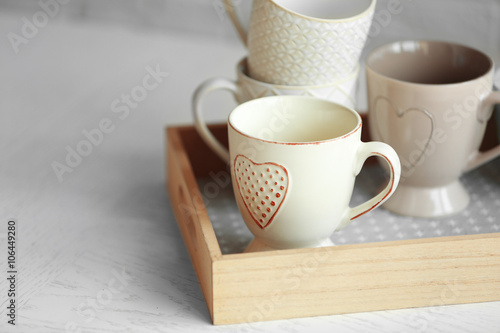 Wooden tray on white table, closeup