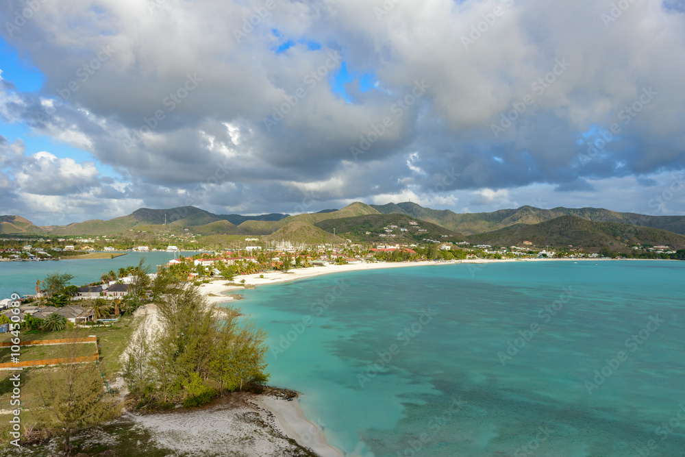 Caribbean bay - Antigua island with white sand, turquoise ocean Caribbean bay - Antigua island with white sand, turquoise ocean