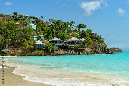 Tropical beach at Antigua island in Caribbean with white sand, t photo