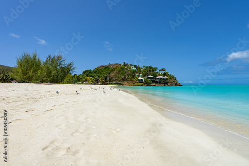 Fototapeta Naklejka Na Ścianę i Meble -  Tropical beach at Antigua island in Caribbean with white sand, t