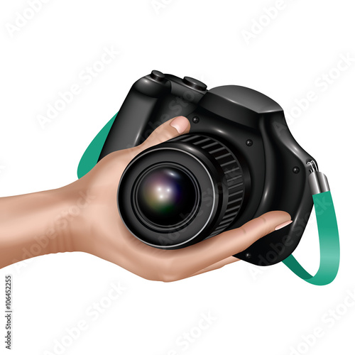 Realistic design hand-held camera photo