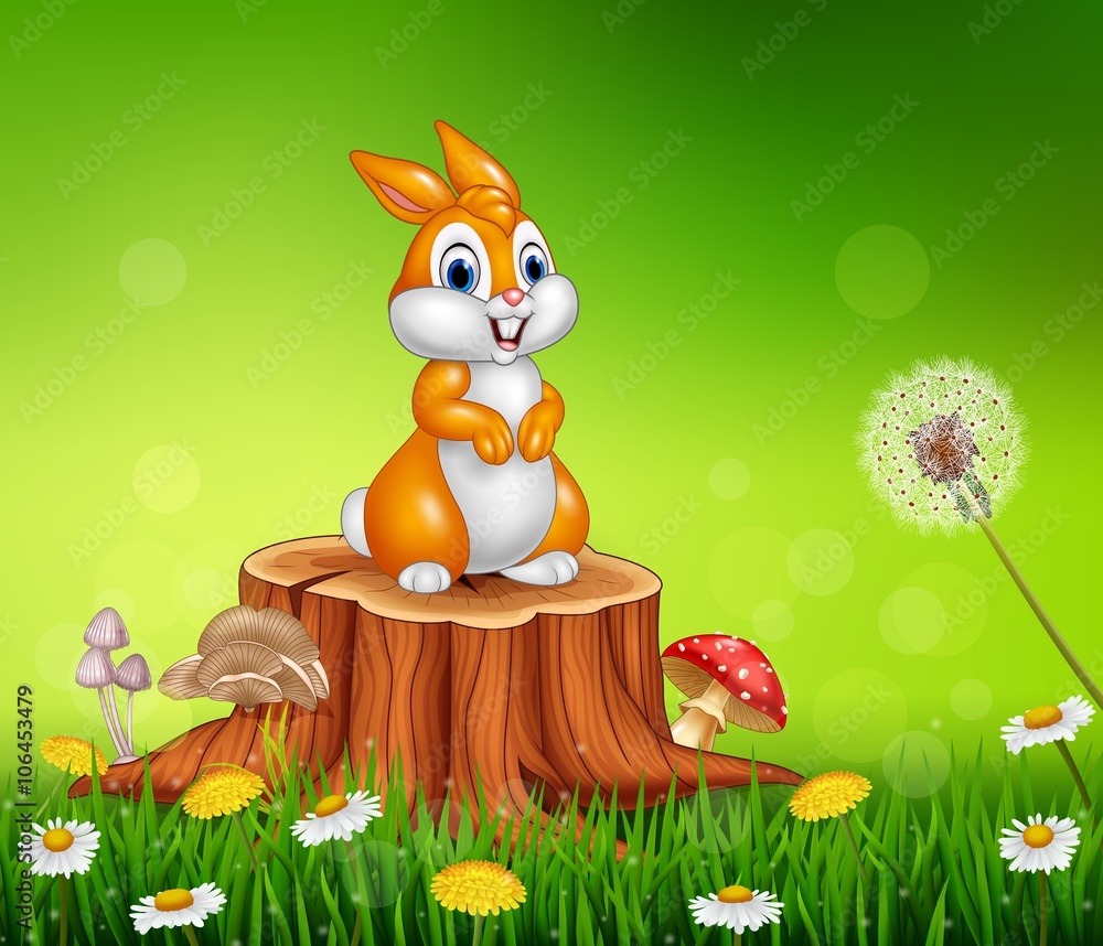 Naklejka premium Cute bunny on tree stump grass background