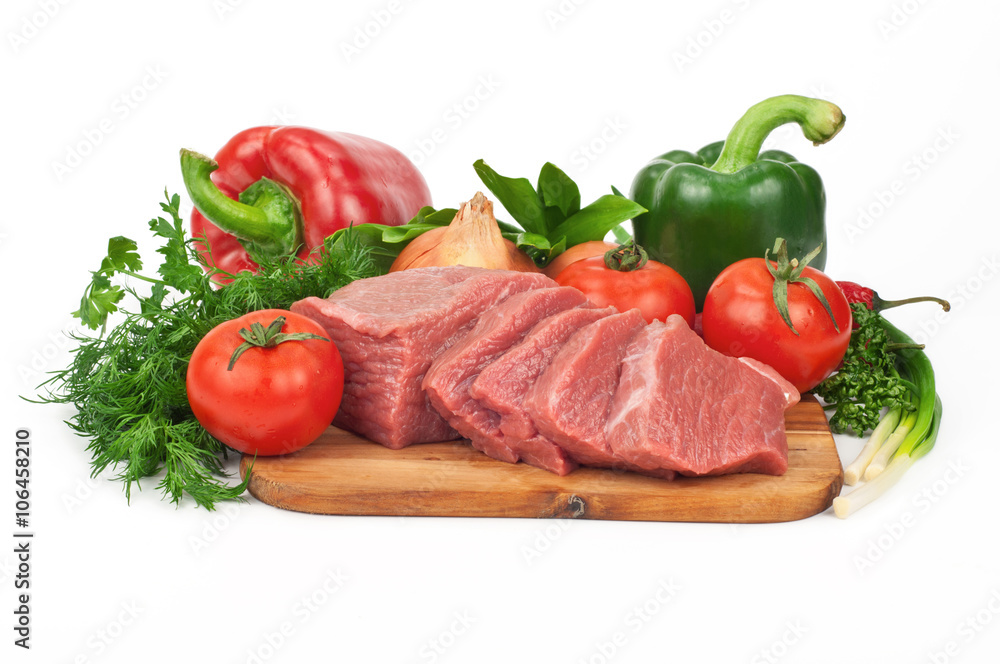 Fresh raw beef meat slices with vegetables