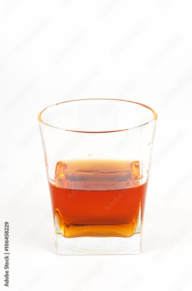 glass of elite brandy on a white background glass of elite brandy on a white background