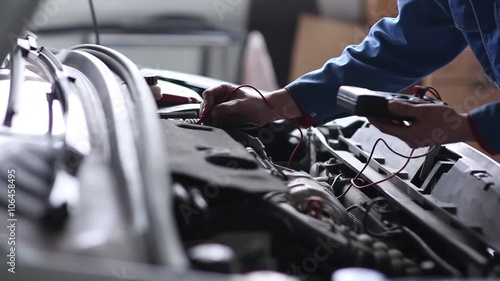 Professional car mechanic, auto repair concept