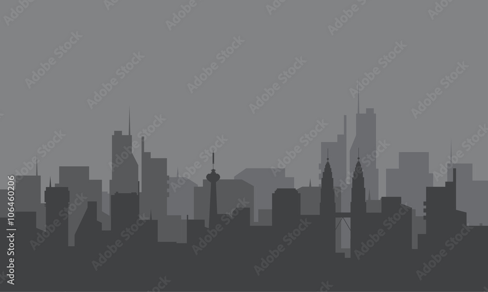 Silhouette of city with a fog