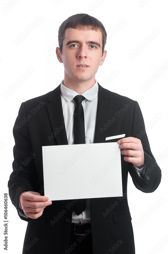 Man in suit with sheet of paper Man in suit with sheet of paper