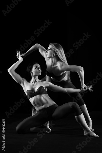 Duet of flexible female dancers