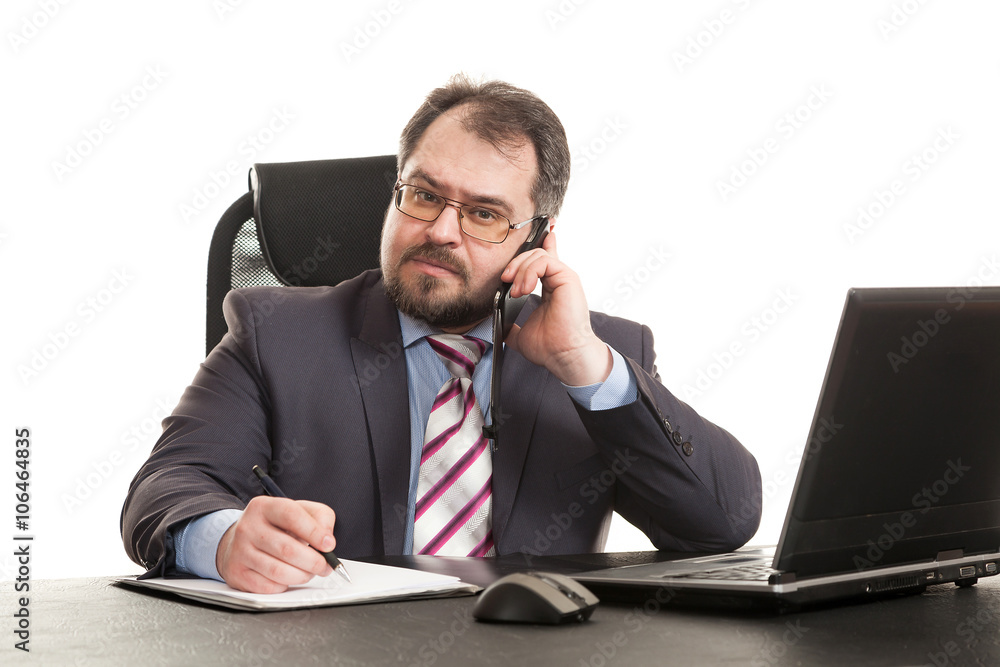 the businessman communicates by phone the businessman communicates by phone