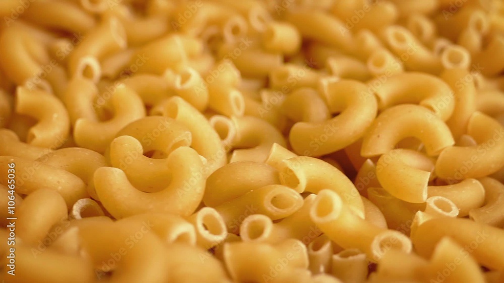 Macaroni Pasta Pieces Rotating Closeup Macaroni Pasta Pieces Rotating Closeup