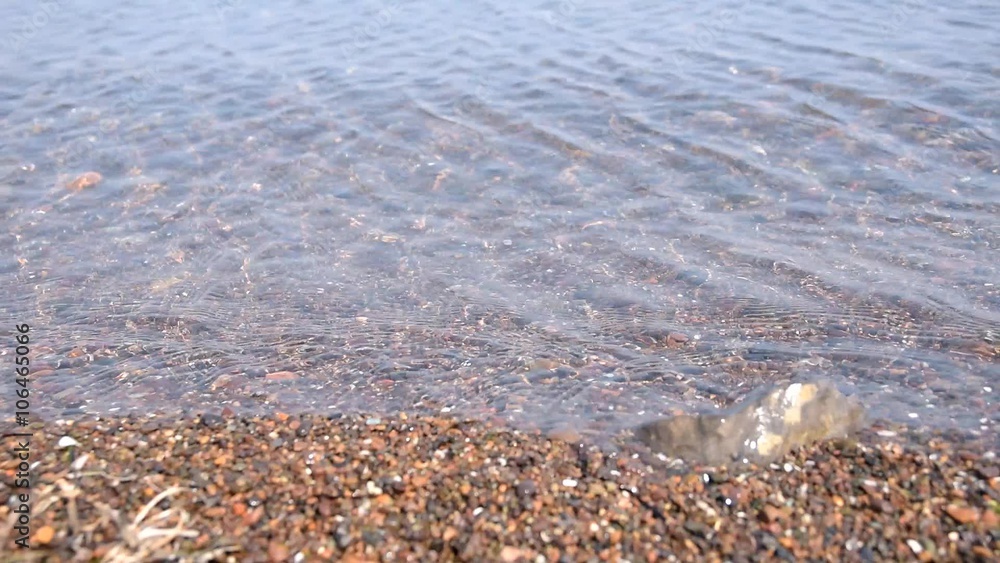 Waves crashing on seashore. Selective focus. Waves crashing on seashore. Selective focus.