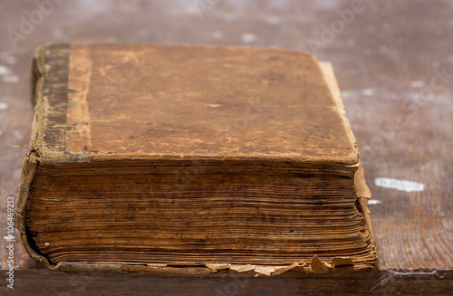 Old book on a wooden table