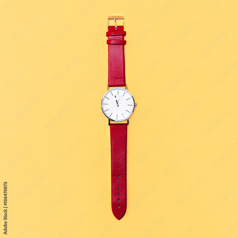 Red clock on yellow background. Minimalism design Red clock on yellow background. Minimalism design