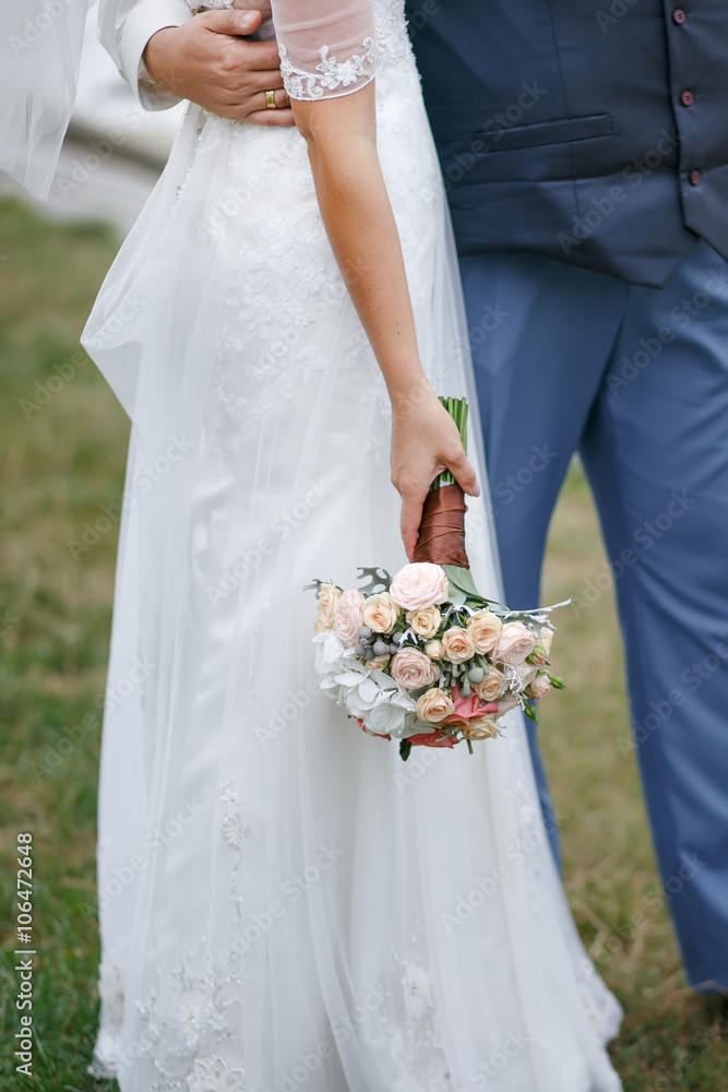 Beautiful young newlyweds embracing. Beautiful young newlyweds embracing.
