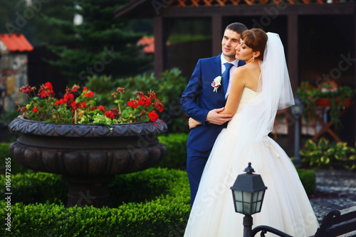 gorgeous beautiful happy young Caucasian couple posing in the ga photo