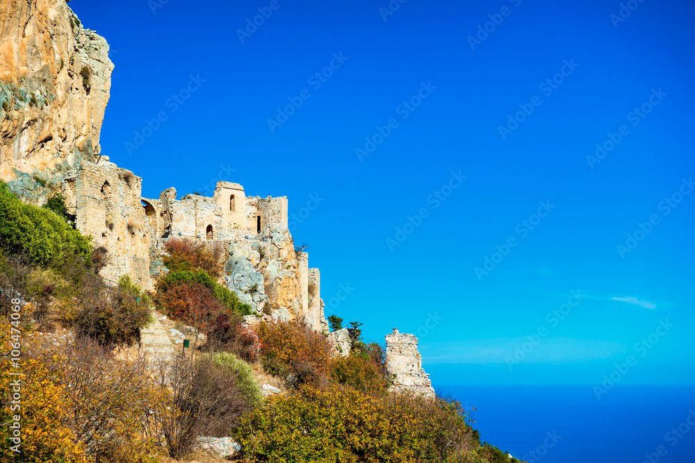 Saint Hilarion Castle on a cliff above the Mediterranean Sea. Ky