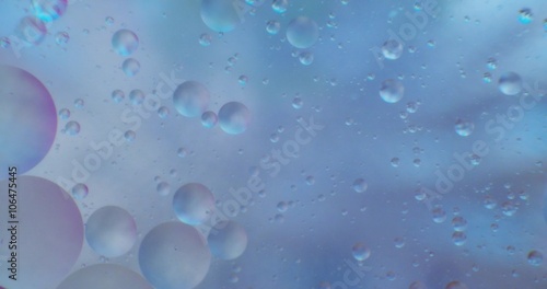 Wallpaper Mural Oil drops floating in water over a colorful underground with oil painting effect. Shot on RED Torontodigital.ca