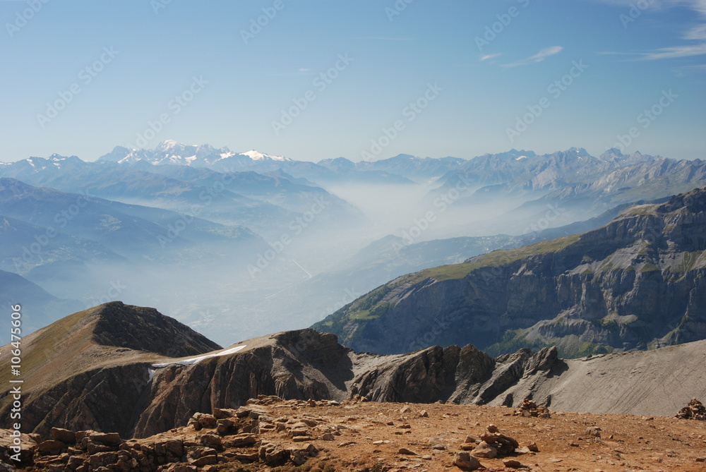 Panoramic view of mountain range and haze in Swiss alps