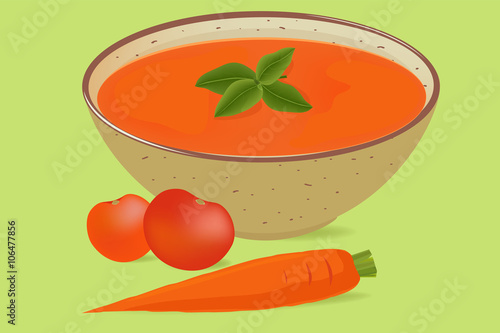 tomato soup in a bowl with a  tomato and a carrot