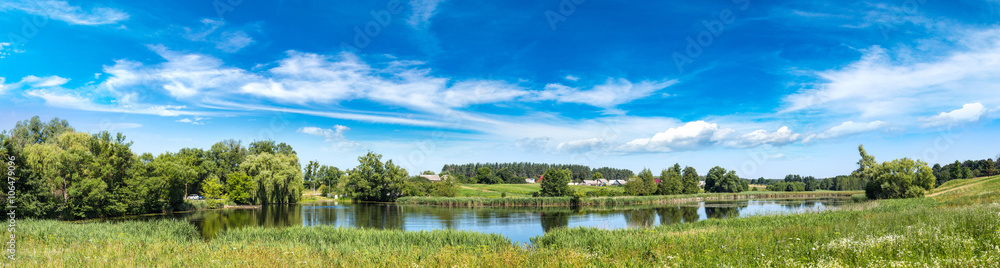 Fototapeta premium Calm pond and water plants