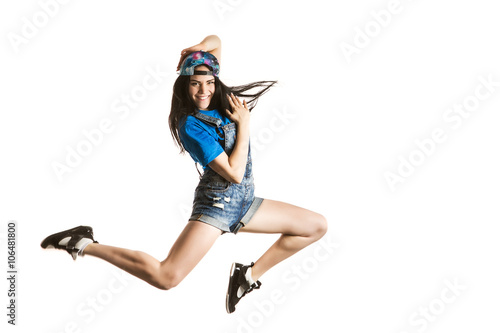 Modern style happy girl dancing isolated on white background. Hip Hop dancer jumping concept.