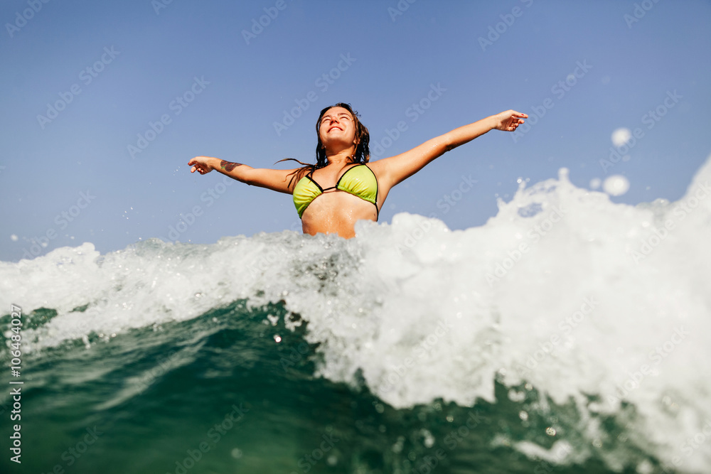 sexy bikini girl swim sea waves splash