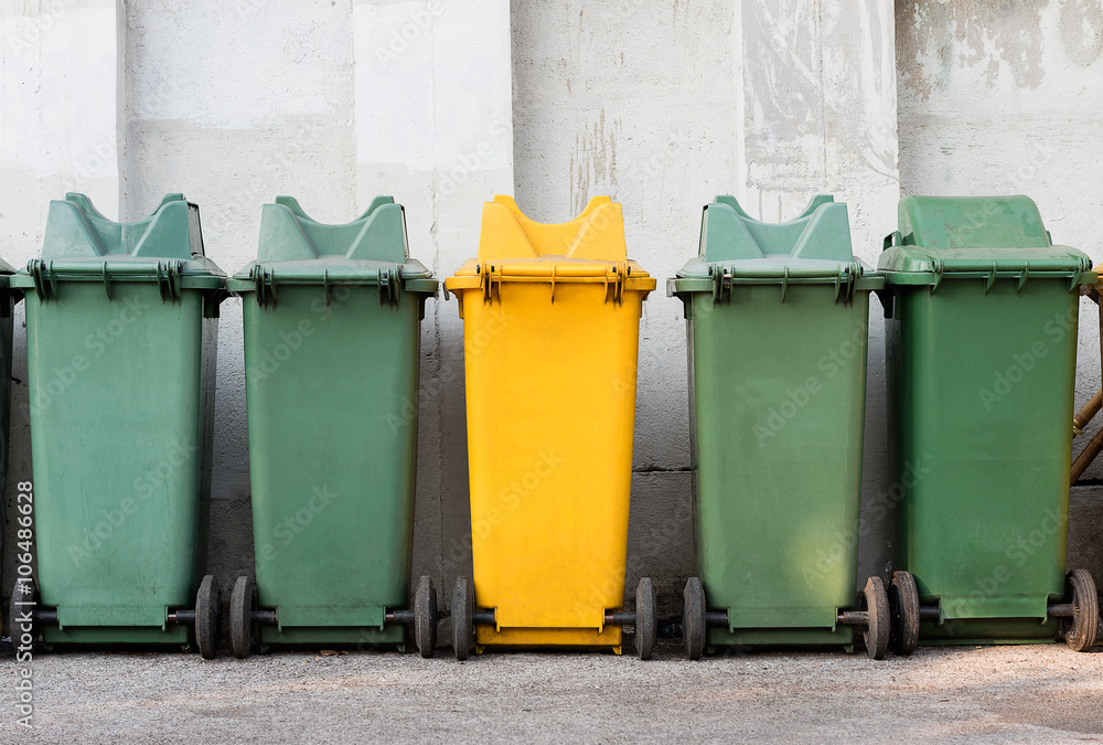 Row of large green wheelie bins for rubbish, recycling and garden waste Stock Photo Adobe Stock