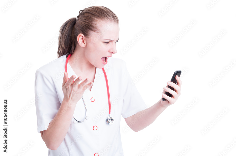 Angry mad doctor or medic woman yelling at phone Angry mad doctor or medic woman yelling at phone