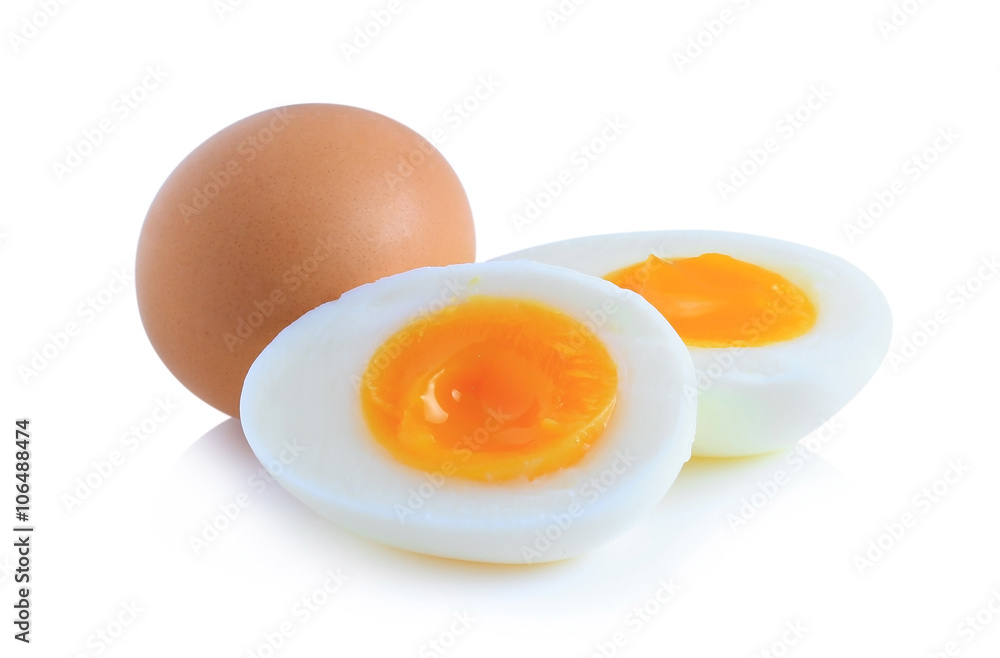 Boiled eggs cut in half isolated on white background. Boiled eggs cut in half isolated on white background.