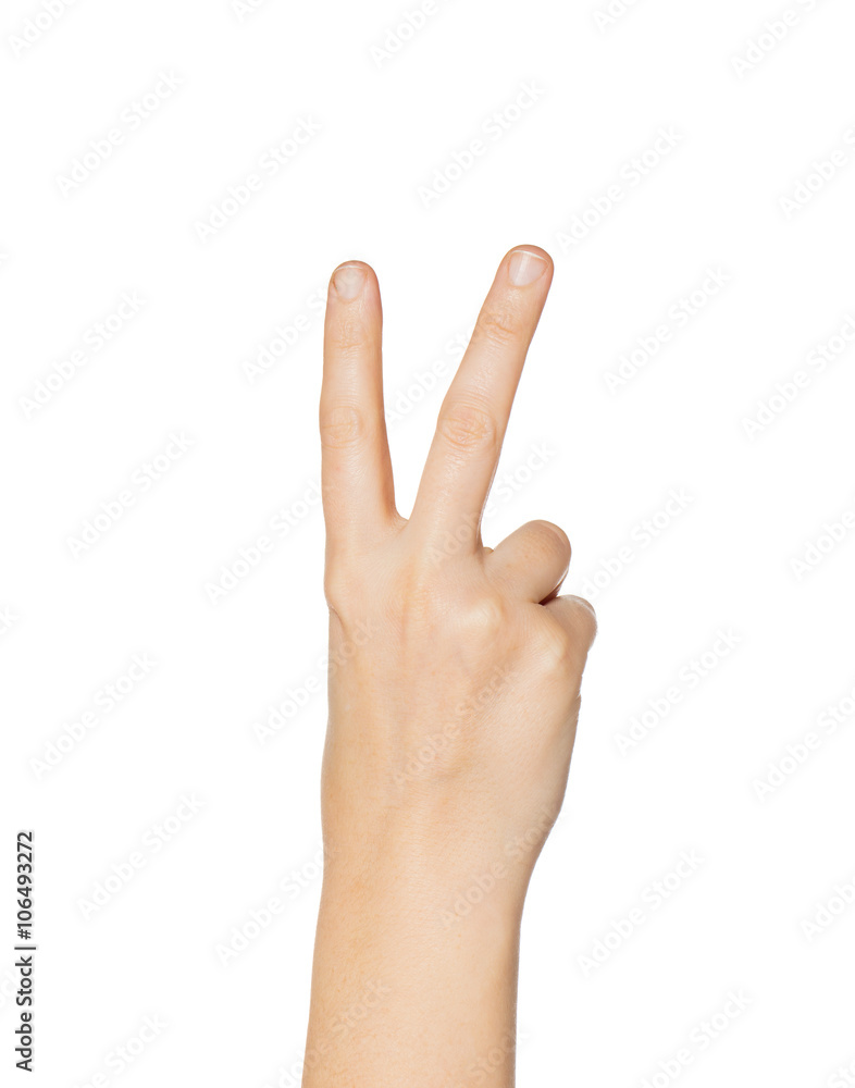close up of hand showing peace or victory sign close up of hand showing peace or victory sign