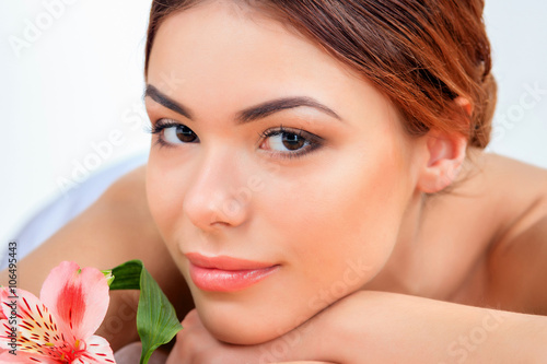 Beautiful young woman at a spa salon