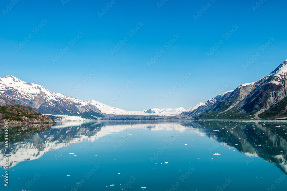 Mountains reflecting in still water, Glacier Bay National Park, Alaska, United States