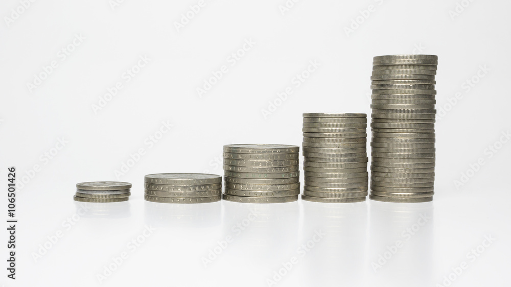 Close up rising stacks of coins represent business productivity and profit. Close up rising stacks of coins represent business productivity and profit.