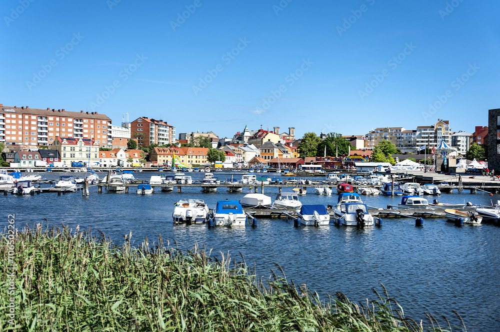 Karlskrona, Sweden - July 07, 2014: Central marina with boats, pier and buildings