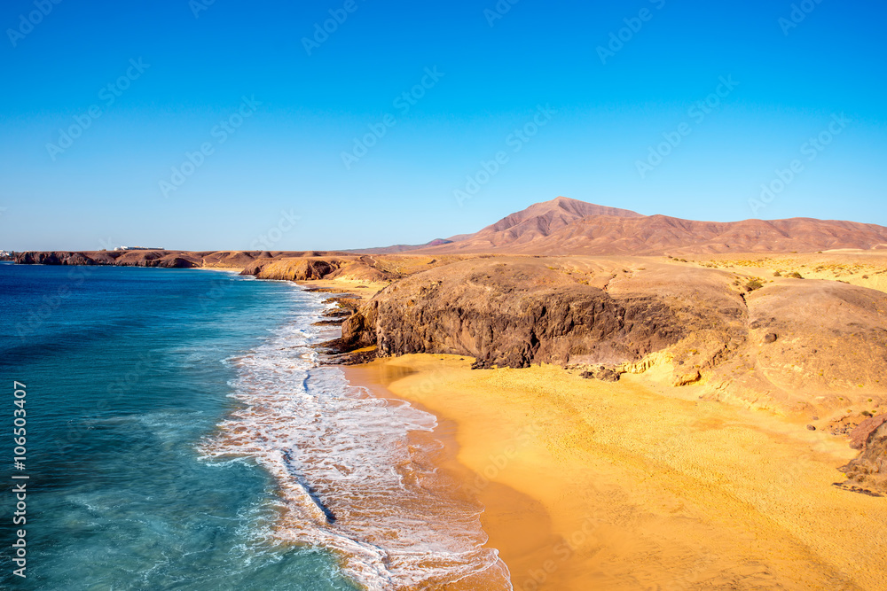 Papagayo beach near Las Coloradas resort on the south of Lanzarote island in Spain