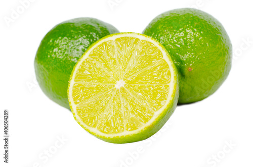 fresh lime wedge isolated on a white background