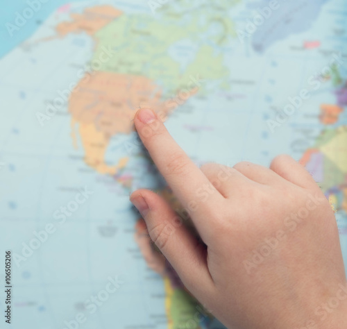 Young tourist couple looking world map will travel